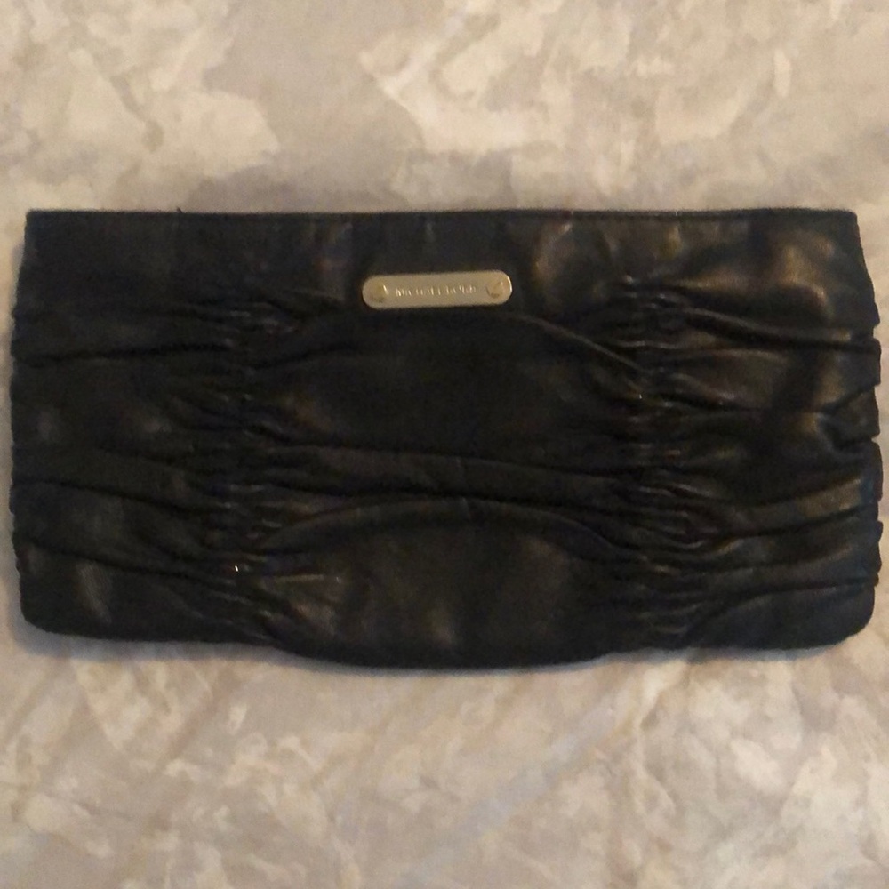 Michael Kors black clutch.